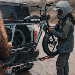 SUPER73-S2 ebike being taken off of 1UP USA x SUPER73 Bike Rack.