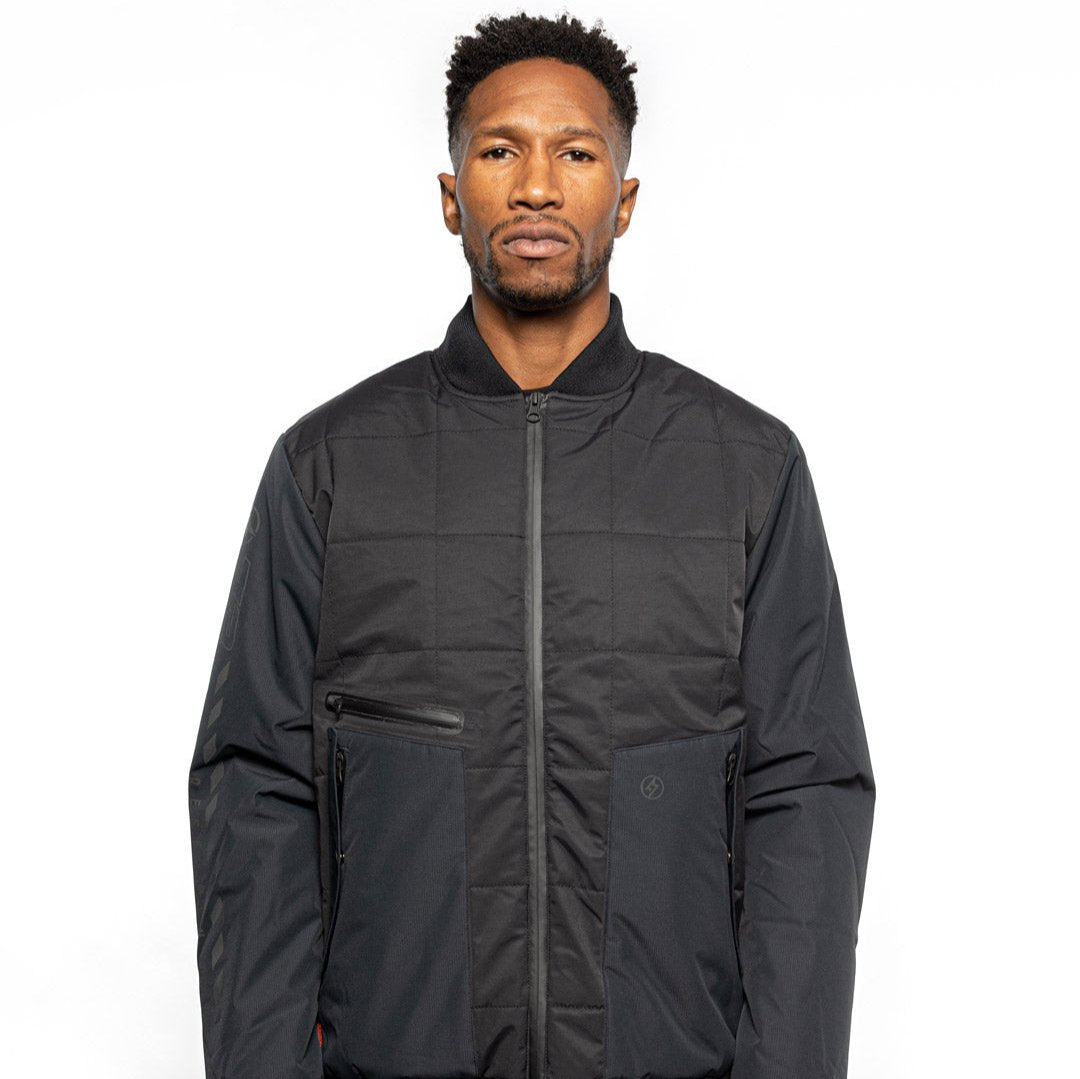 Male model wearing Sipes Varsity Jacket in black colorway. @color_black