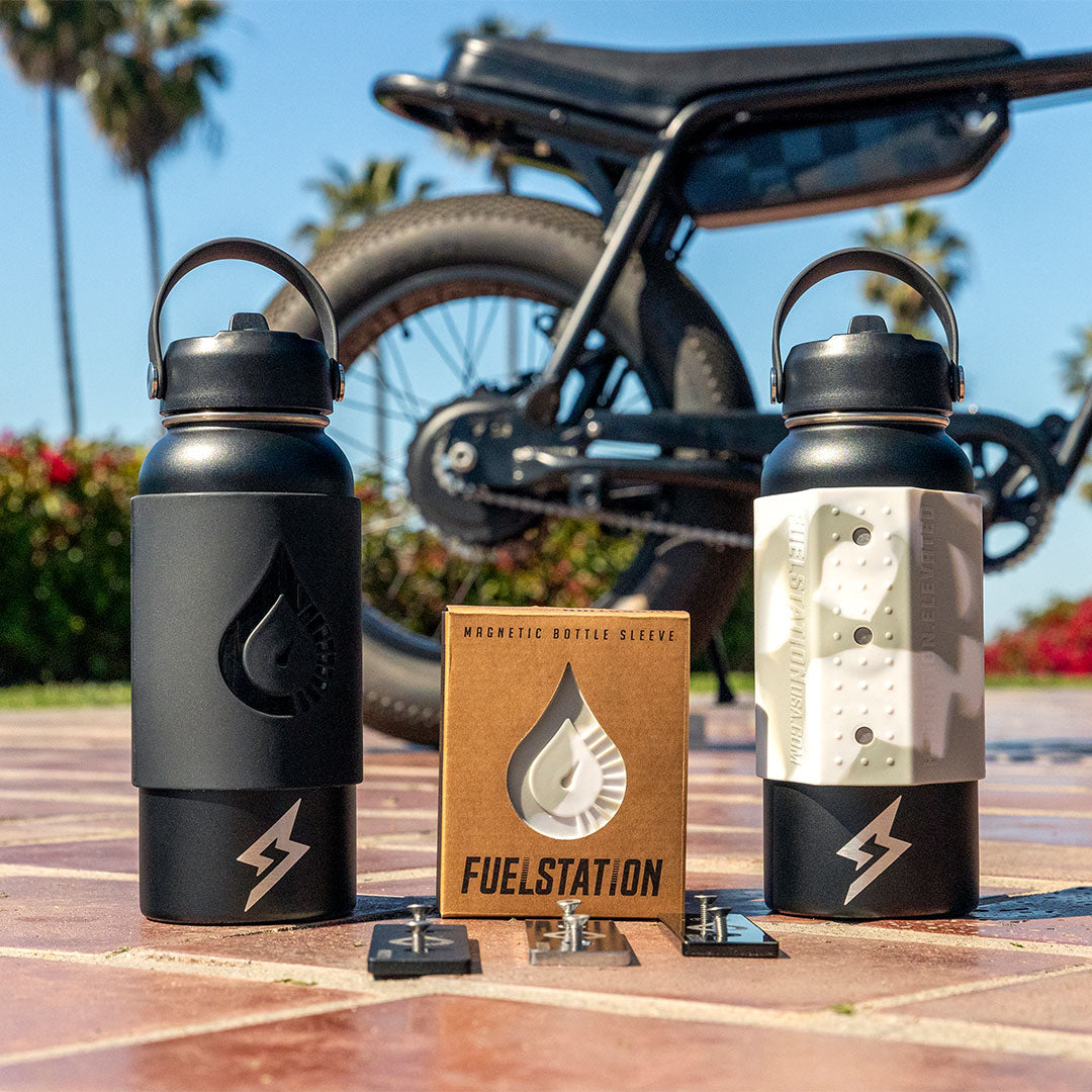 SUPER73 x FUELSTATION water bottles & magnetic sleeves in Black and Snow Camo