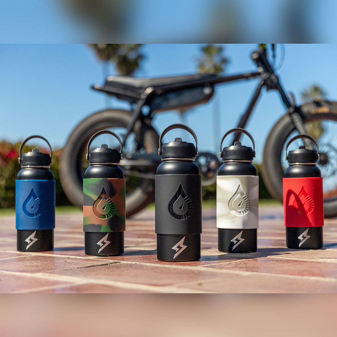 SUPER73 x FUELSTATION water bottles & magnetic sleeves in Dark Blue, Camouflage, Black, Snow Camo, and Red