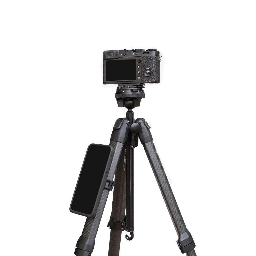 product image of Peak Design Universal Bike Mount being used on a tripod