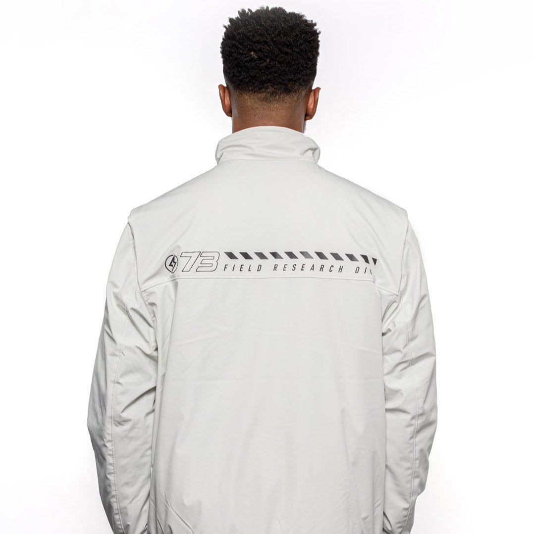 Back view of Male model wearing Royce Harrington Jacket in Chalk colorway. @color_chalk