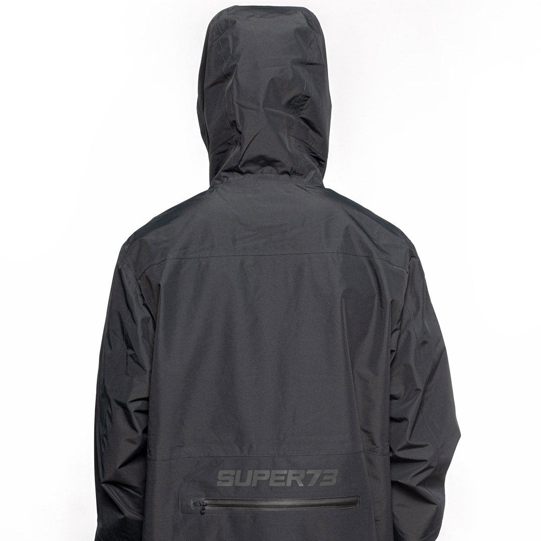 Male model wearing Vale Packable Anorak in black colorway. @color_black